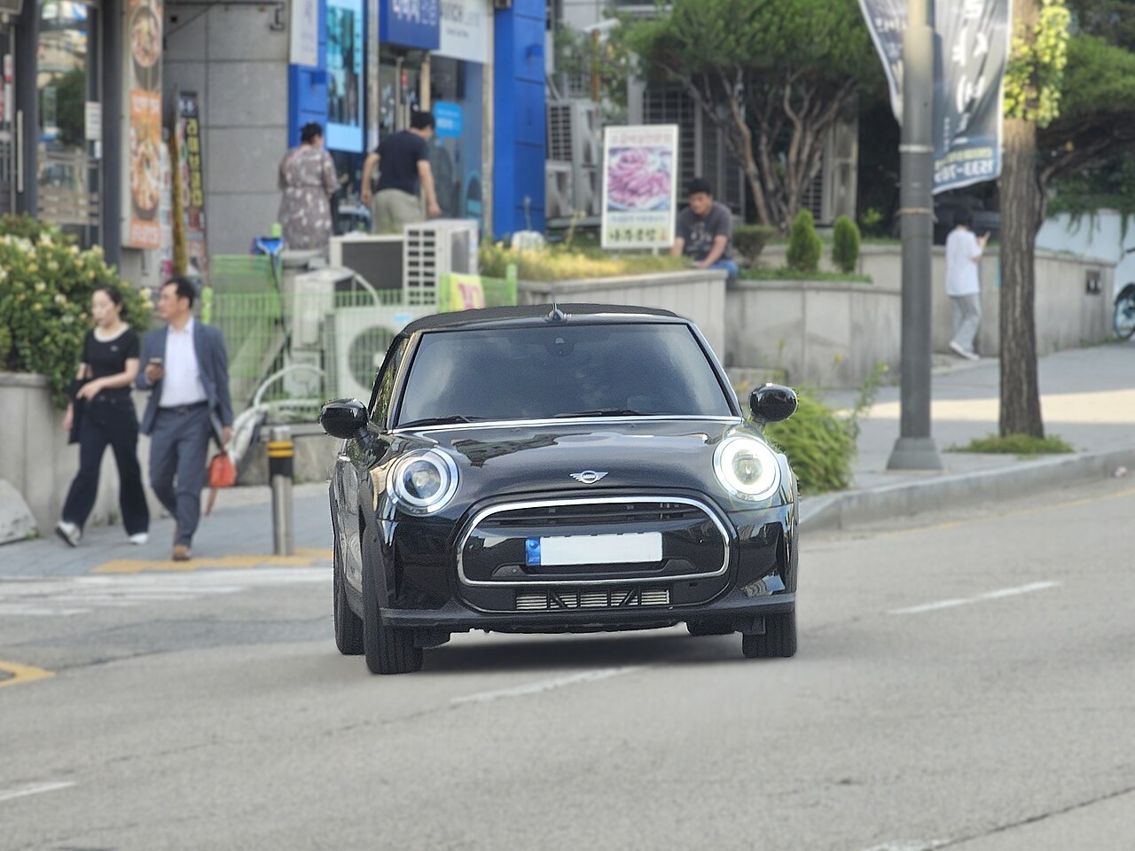 Representative MINI Cooper Convertible body; MINI F57 LCI Convertible Cooper Midnight Black (3).jpg