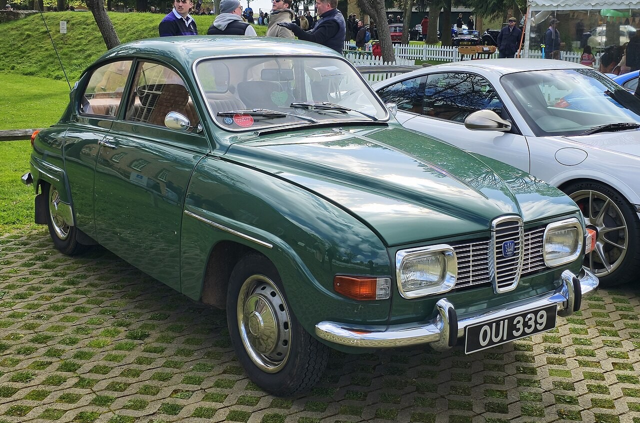 1970 Saab 96 — period body example only; the book’s early six-pin model application is not verified