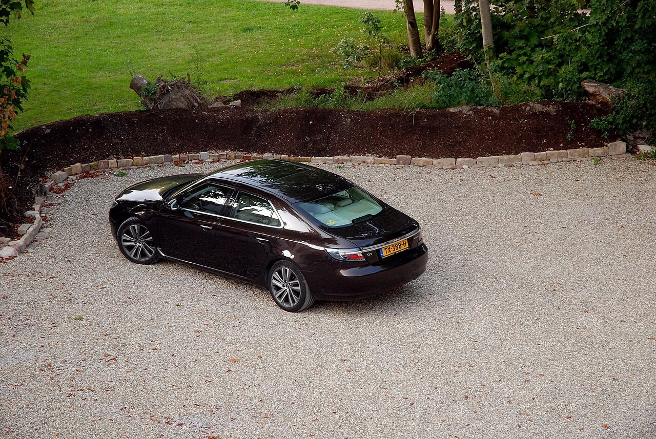 2011 Saab 9-5 Turbo4 BioPower — representative body; installed locks and market require verification