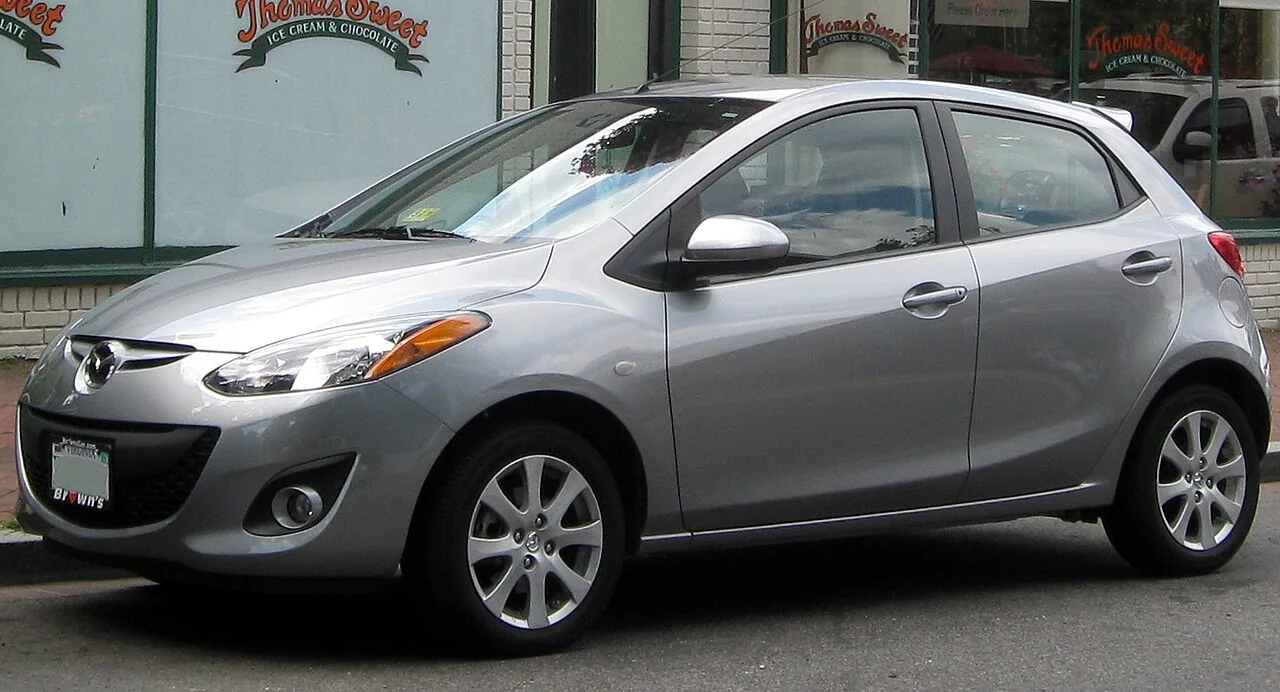 2011–2014 Mazda Mazda 2 — representative vehicle generation; 2011 US-market Touring shown