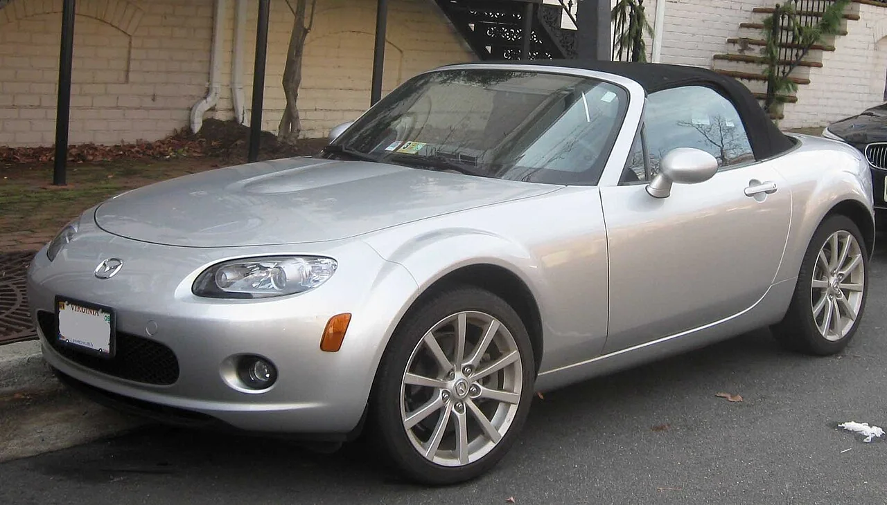 2006–2008 Mazda MX-5 Miata — representative vehicle generation; Original North American NC front design; US soft top shown