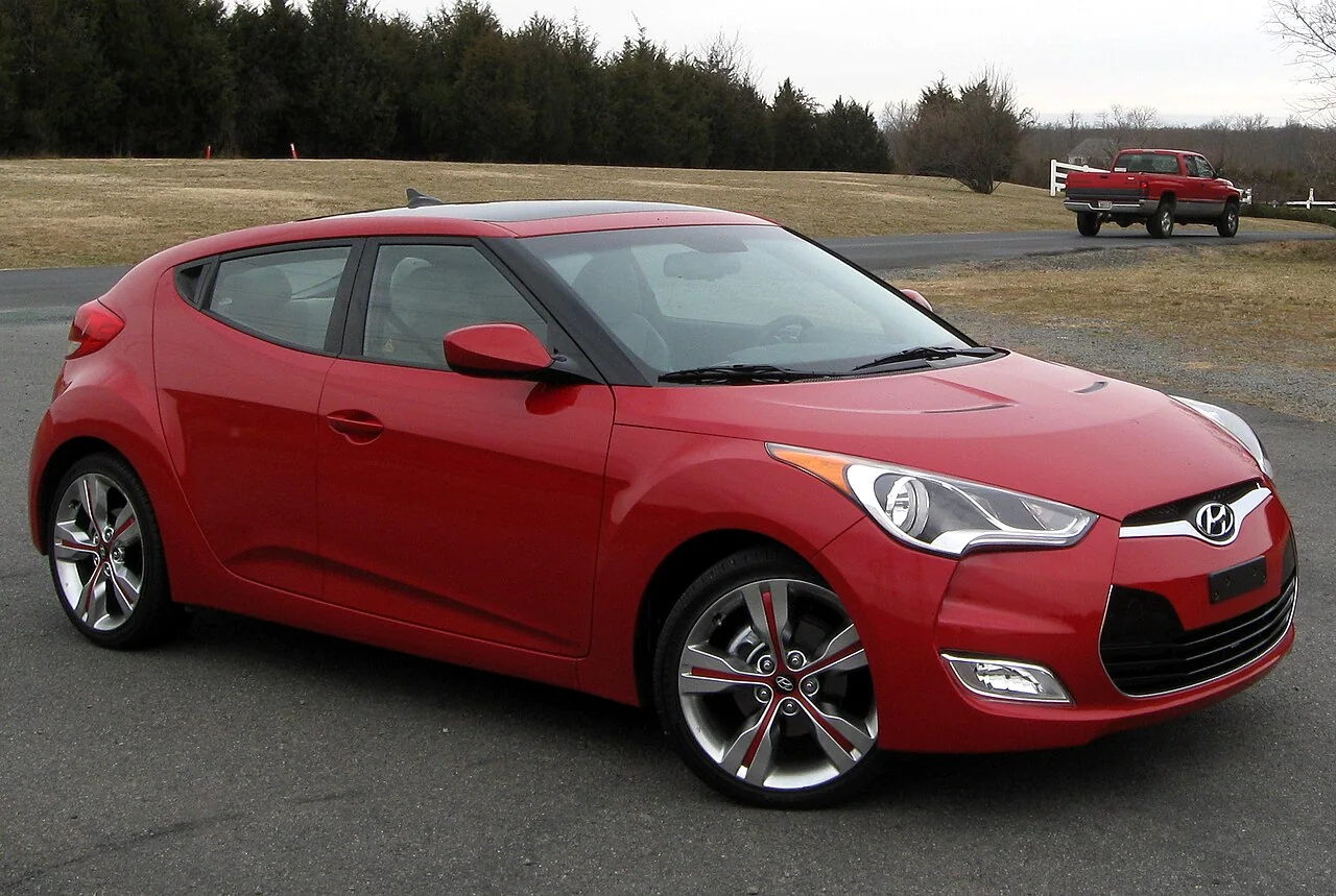 2012–2017 Hyundai Veloster — representative vehicle generation; 2012 US naturally aspirated first-generation example; Turbo versions have different front trim