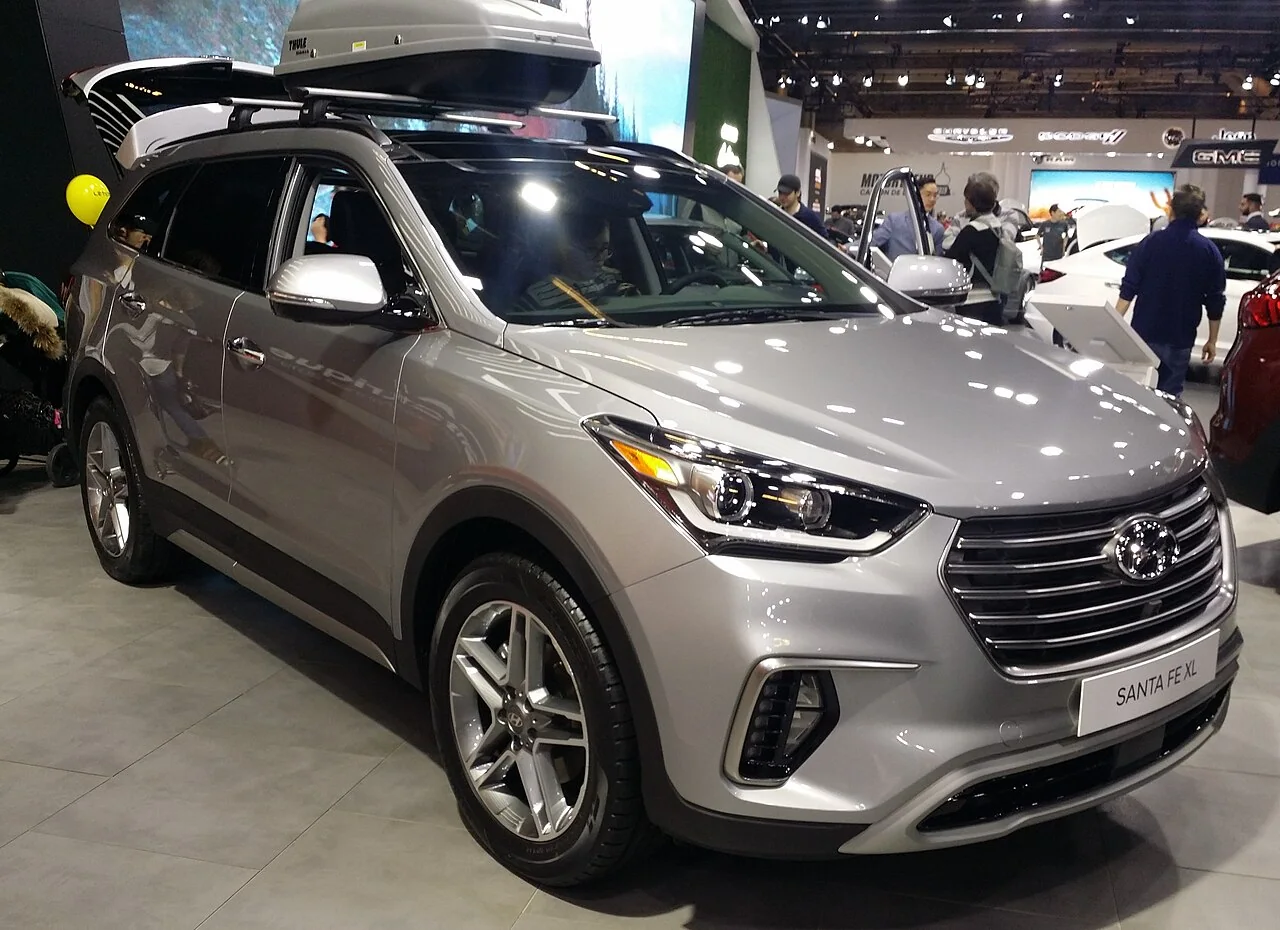 2019 Hyundai Santa Fe XL — representative vehicle generation; 2019 Canadian auto-show example with roof cargo box and open rear liftgate; market trim may differ