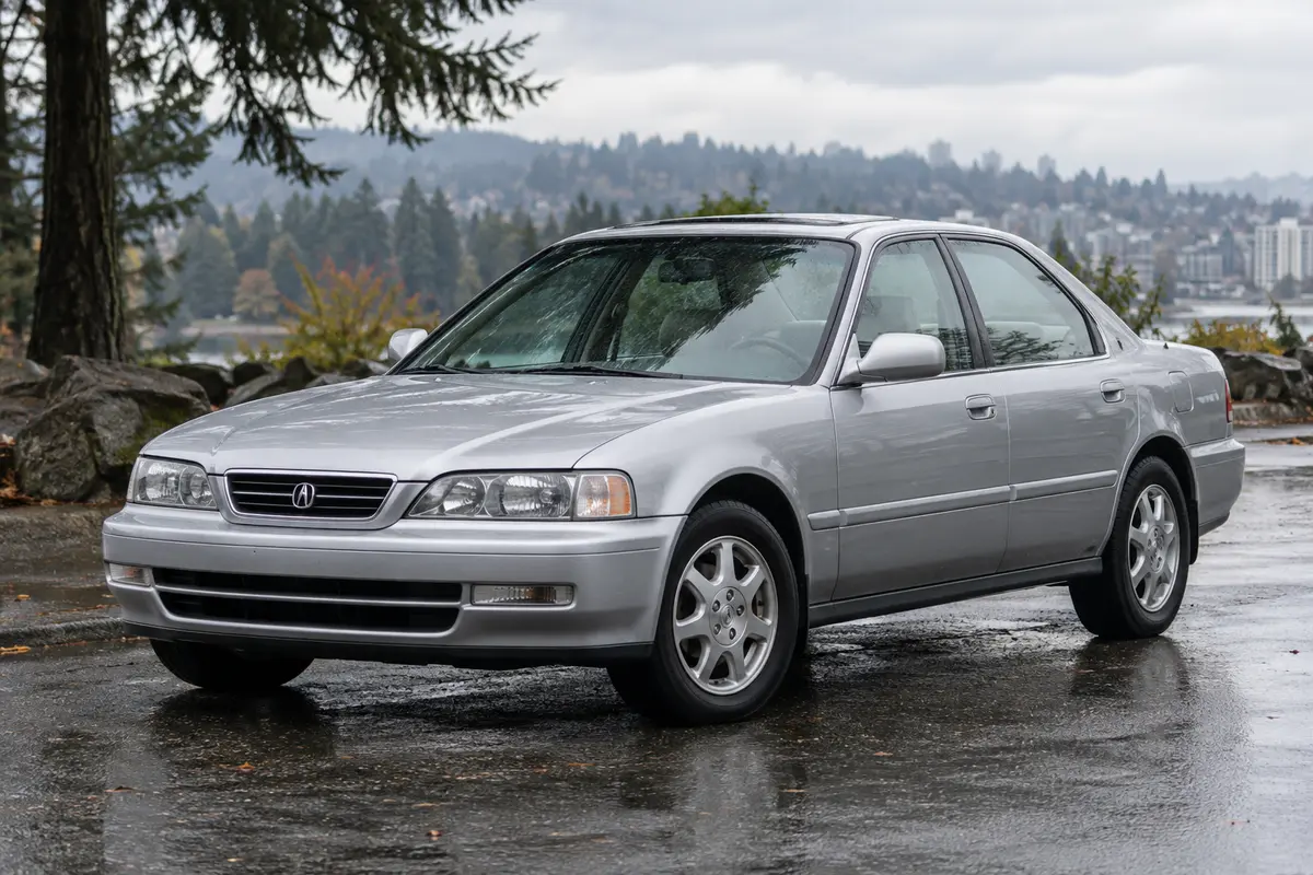 1996 through 1998 Acura TL parked in a Pacific Northwest setting