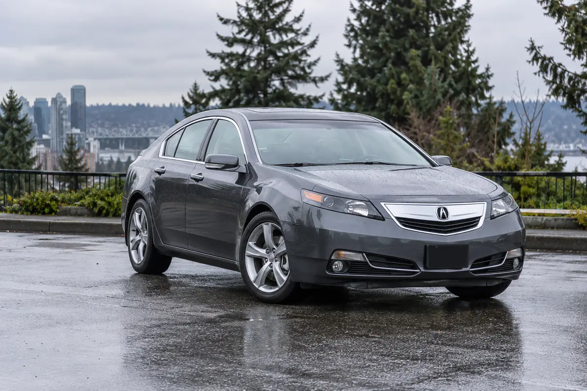 2009 through 2014 Acura TL parked in a Pacific Northwest setting