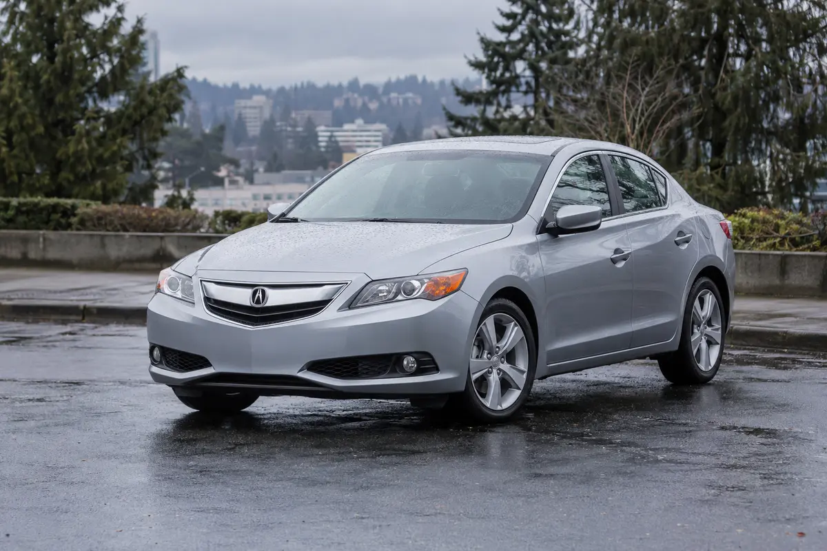 2014 through 2018 Acura ILX parked in a Pacific Northwest setting
