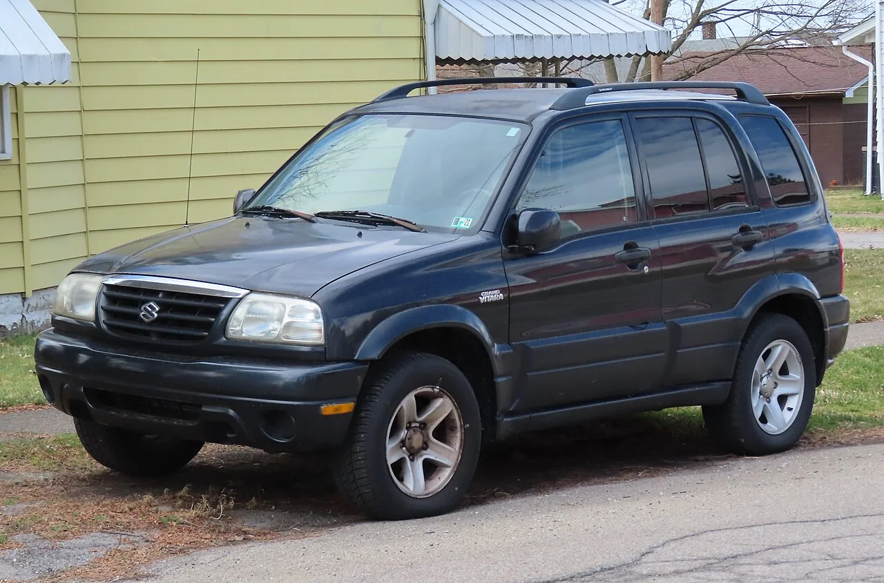 2003 Suzuki Grand Vitara — representative vehicle generation; 2001 grille and bumper update
