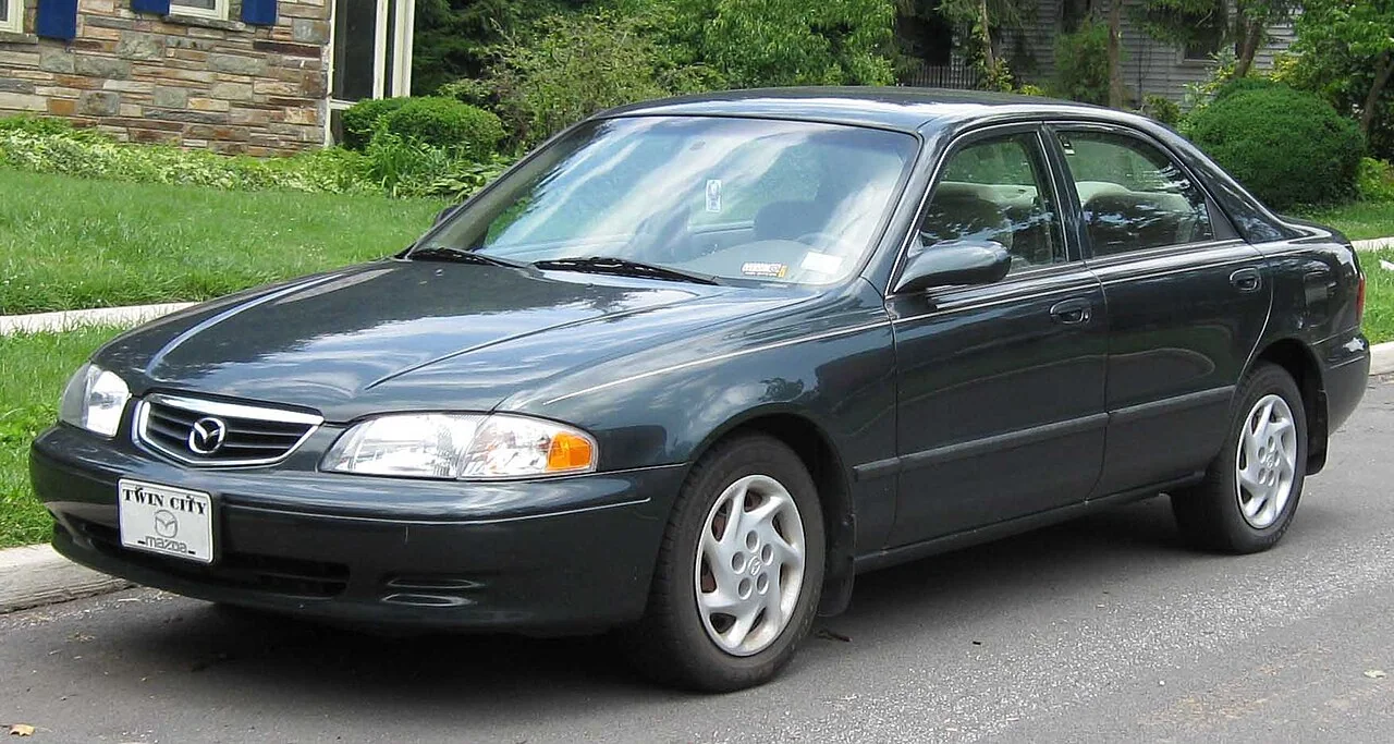 2000–2002 Mazda 626 — representative vehicle generation; North American grille and headlamp facelift