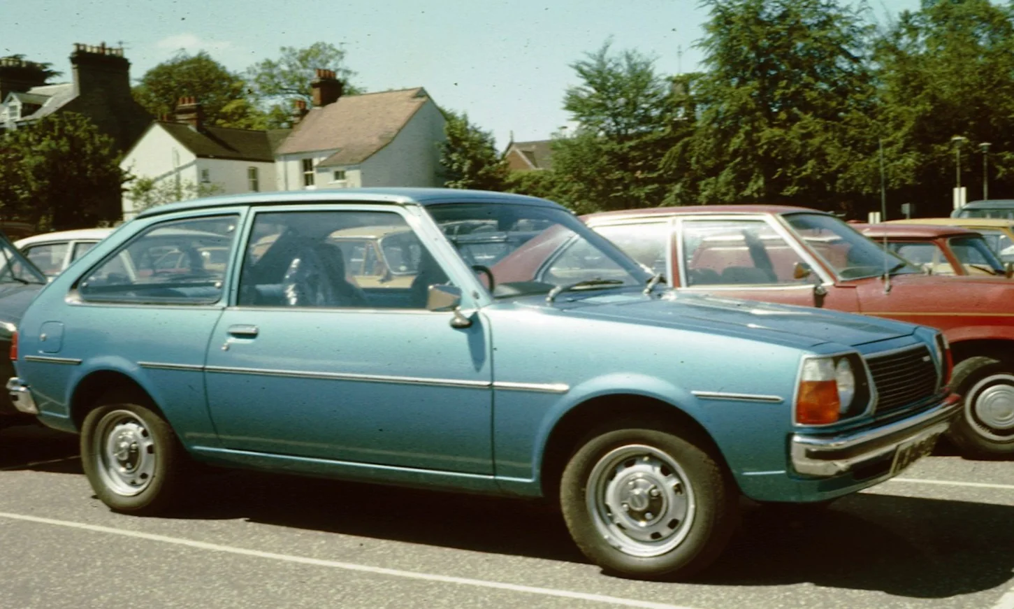 1980 Mazda 323 — representative vehicle generation; FA4 rear-wheel-drive hatchback; European 323 shown, sold as GLC in North America