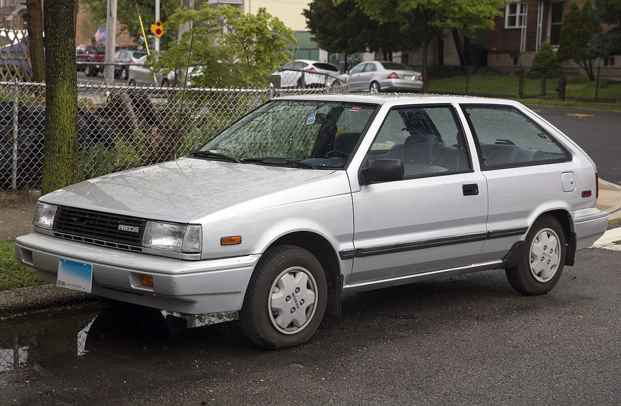 1987–1989 Mitsubishi Precis — representative vehicle generation; 1989 RS US hatchback example
