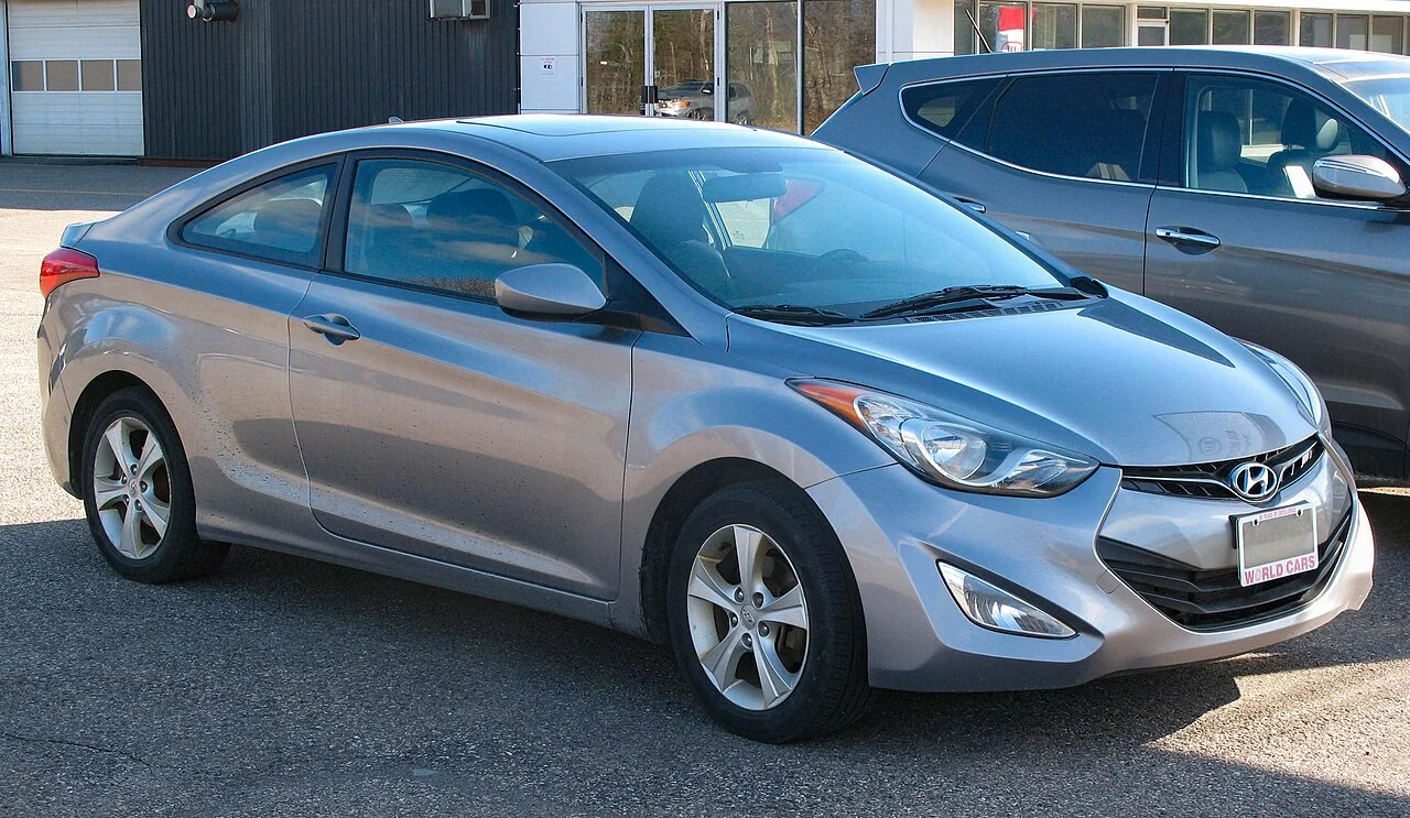 2013–2014 Hyundai Elantra Coupe — representative vehicle generation; 2013 Canadian GLS coupe example; market trim and equipment may differ