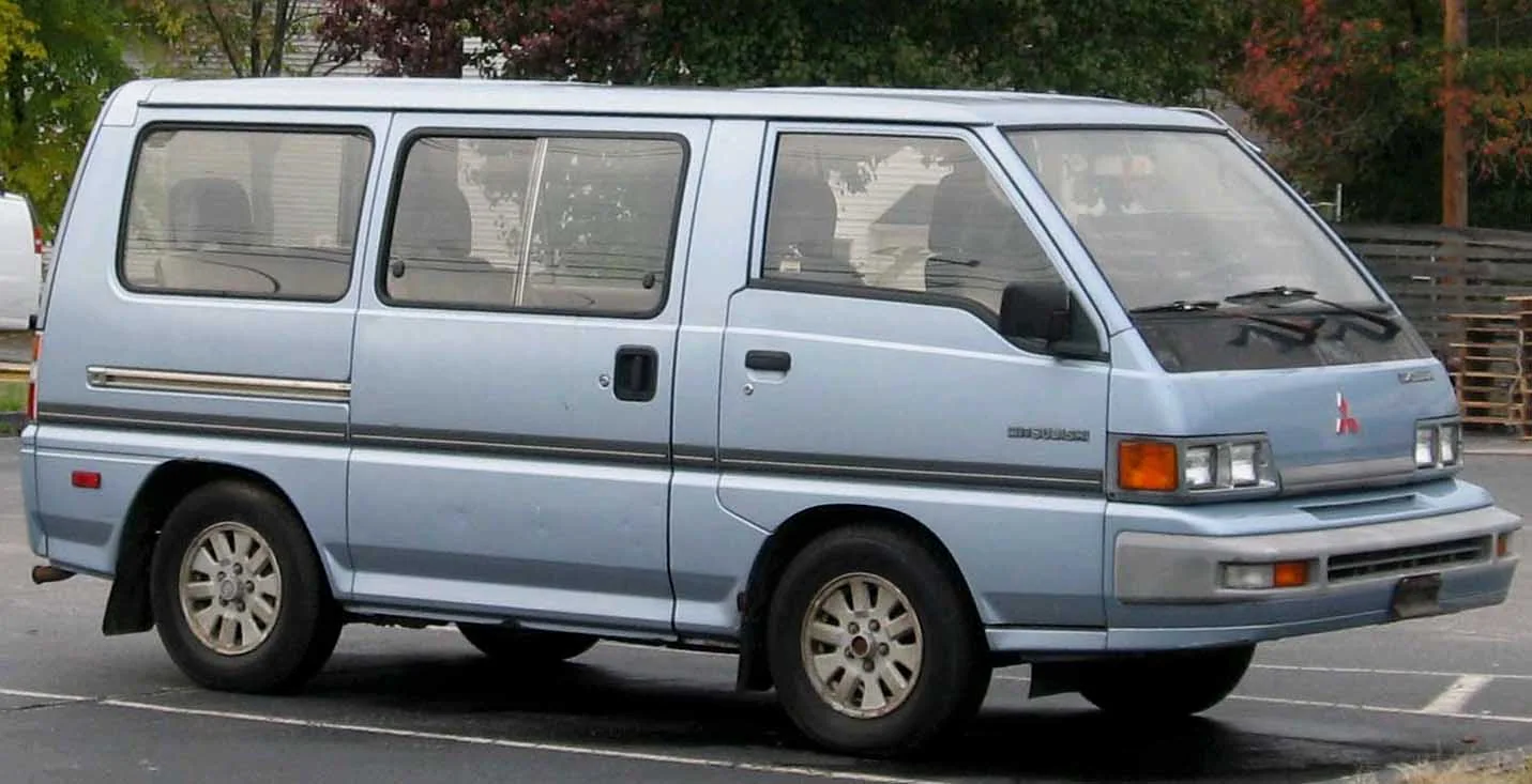 1987–1990 Mitsubishi Van — representative vehicle generation; US Wagon GLS passenger-body example; exact model year unspecified; cargo configuration differs