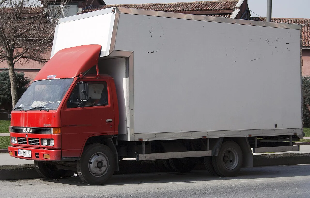 Period Isuzu N-series cab, representative of this generation; cab/chassis and market details vary.